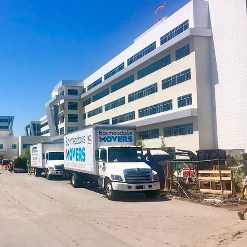 Moving truck in front of a building